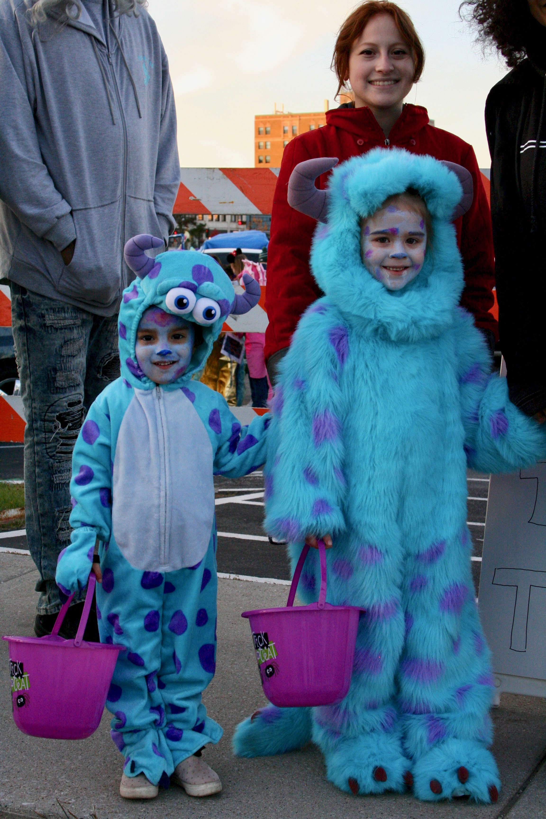 Children dressed in blue monster costumes