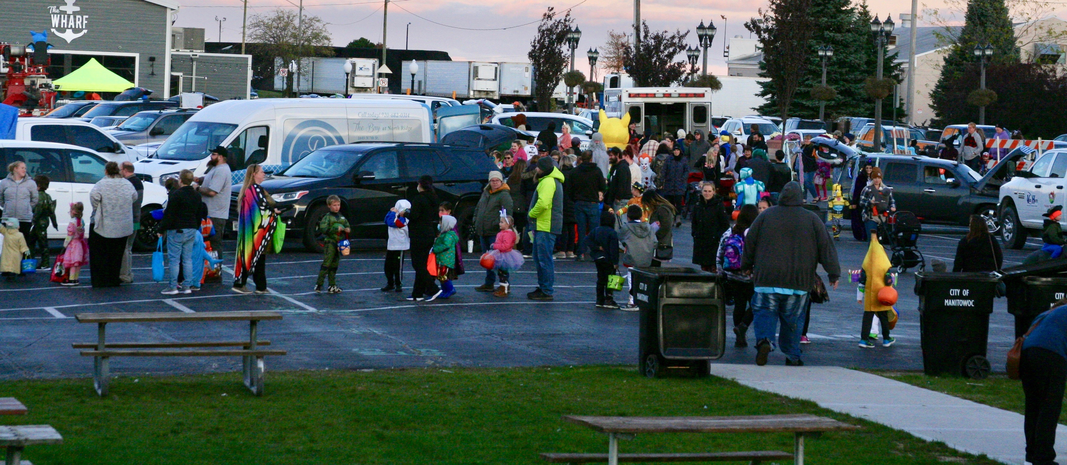 Wide angle shot of participants at trunk or treat event