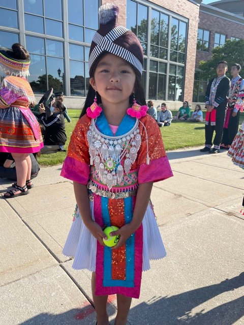 Child wearing traditional Hmong dress