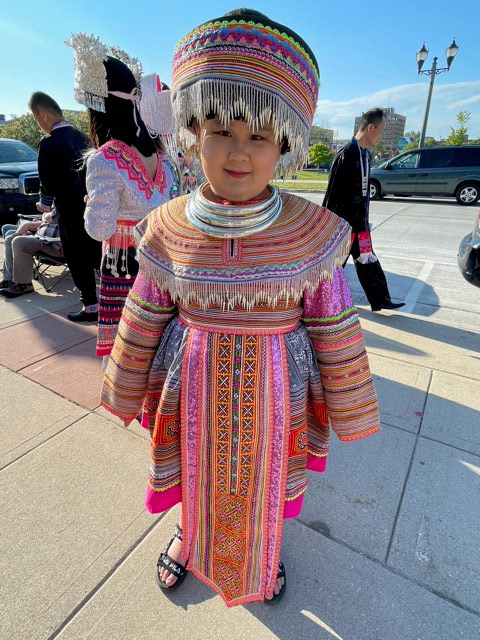 Child wearing traditional Hmong dress