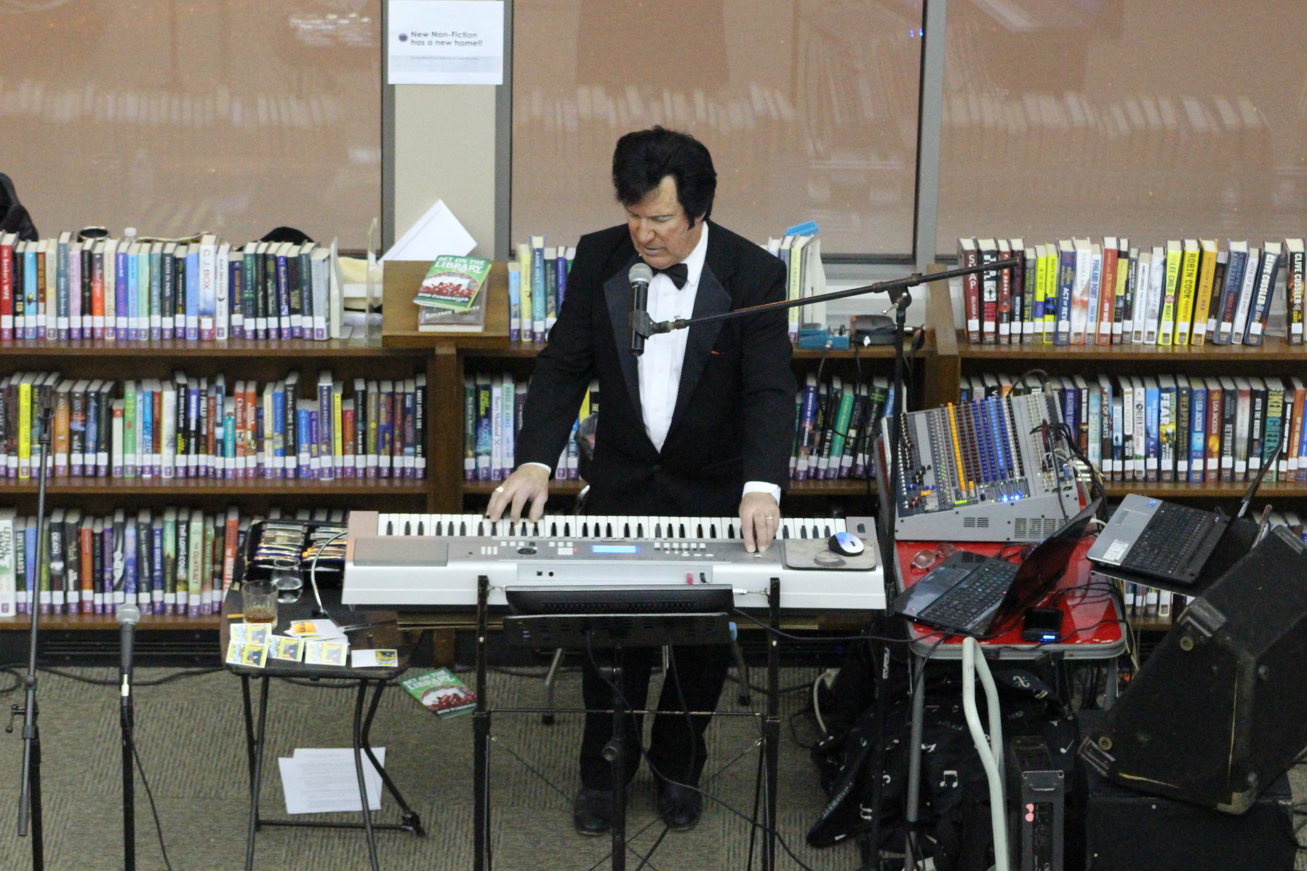 Tuxedo-wearing performer at keyboard