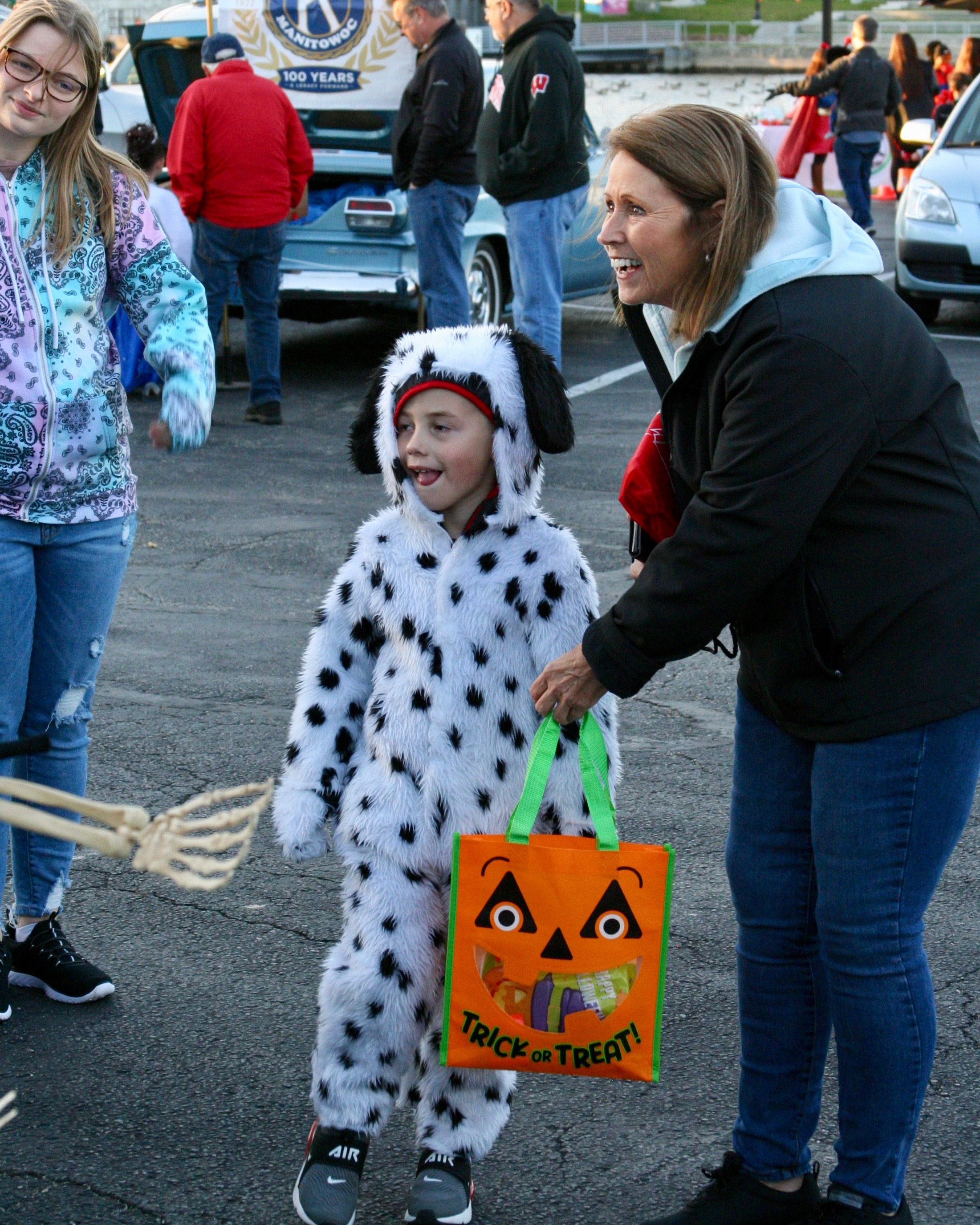 Woman with child dressed as a puppy