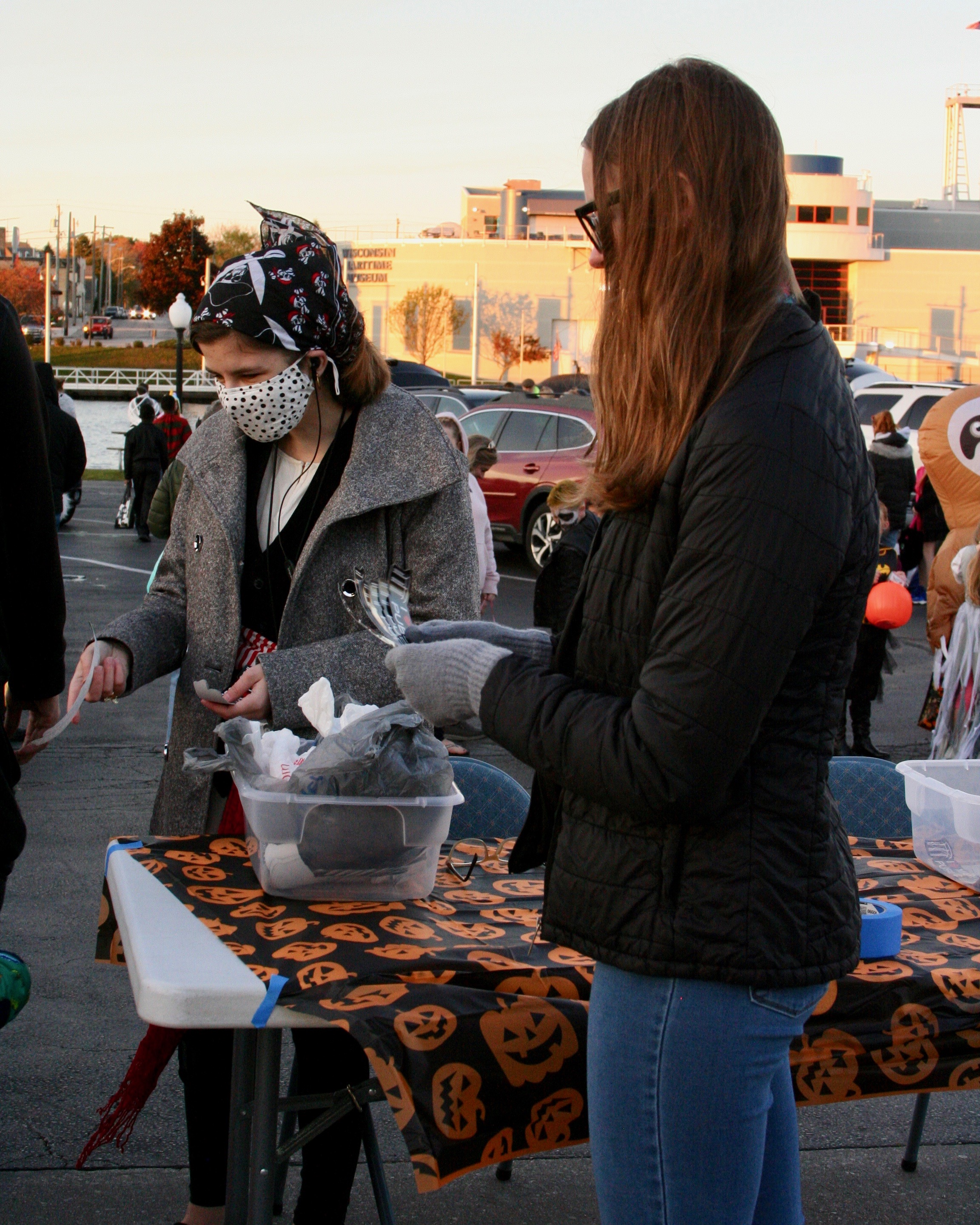 Participants passing out treats