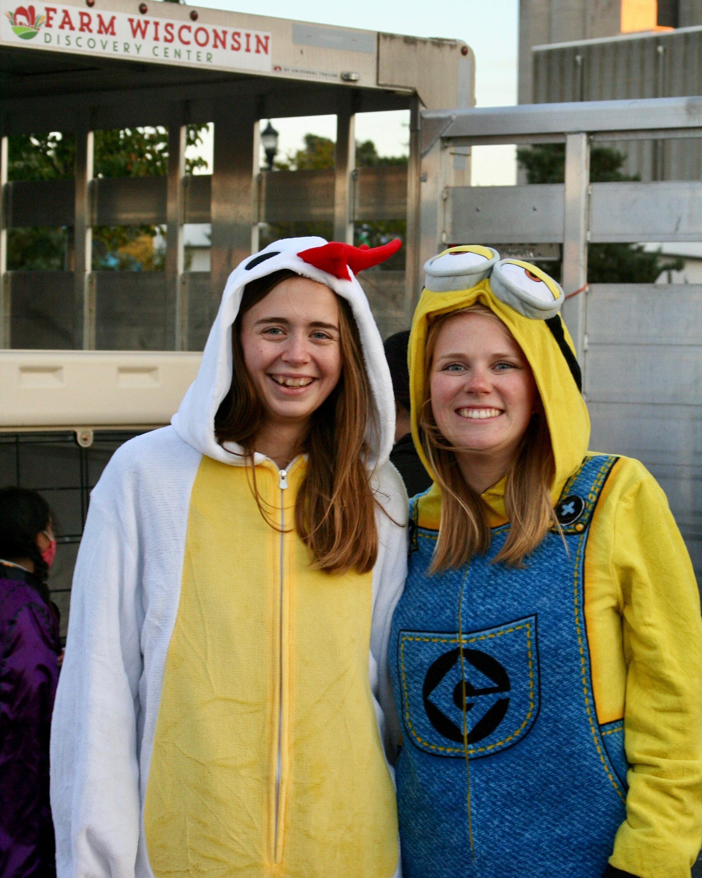 People dressed as a chicken and a minion