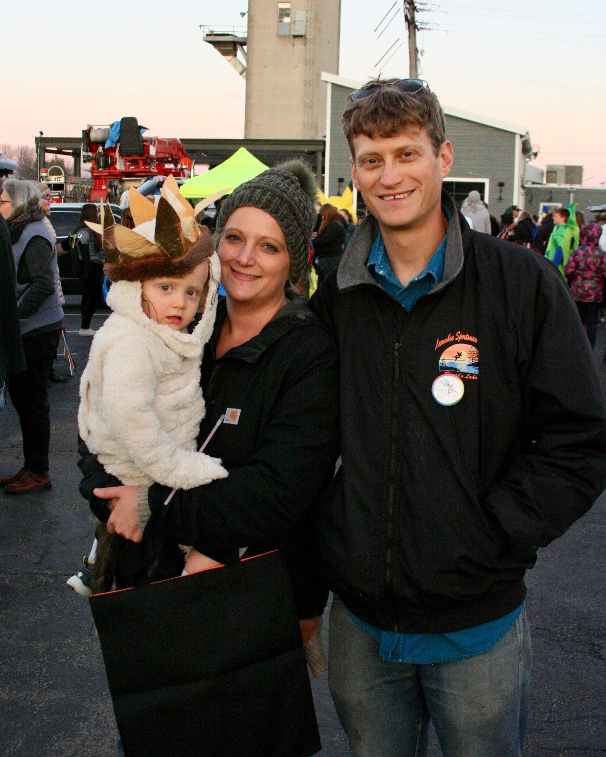 Family with small child dressed as Max from Where the Wild Things Are