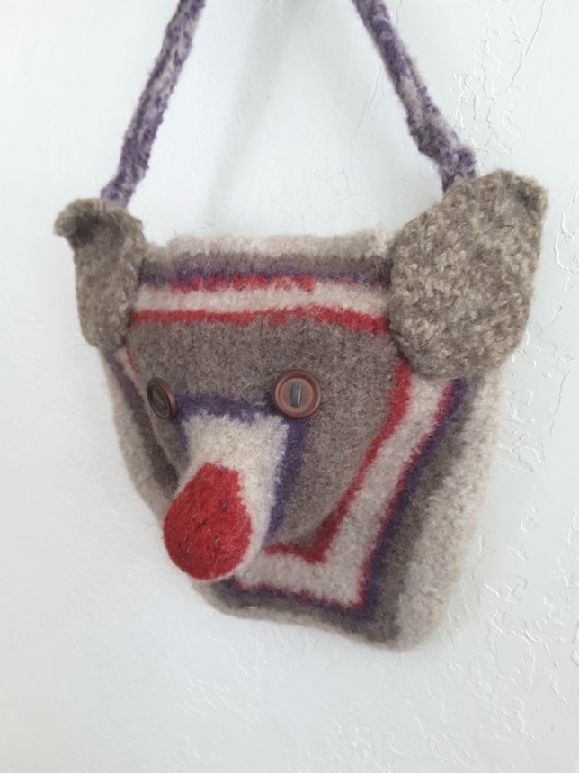 Awful art winner: purse shaped like small rodent face in felted knit by Jean S (adult)