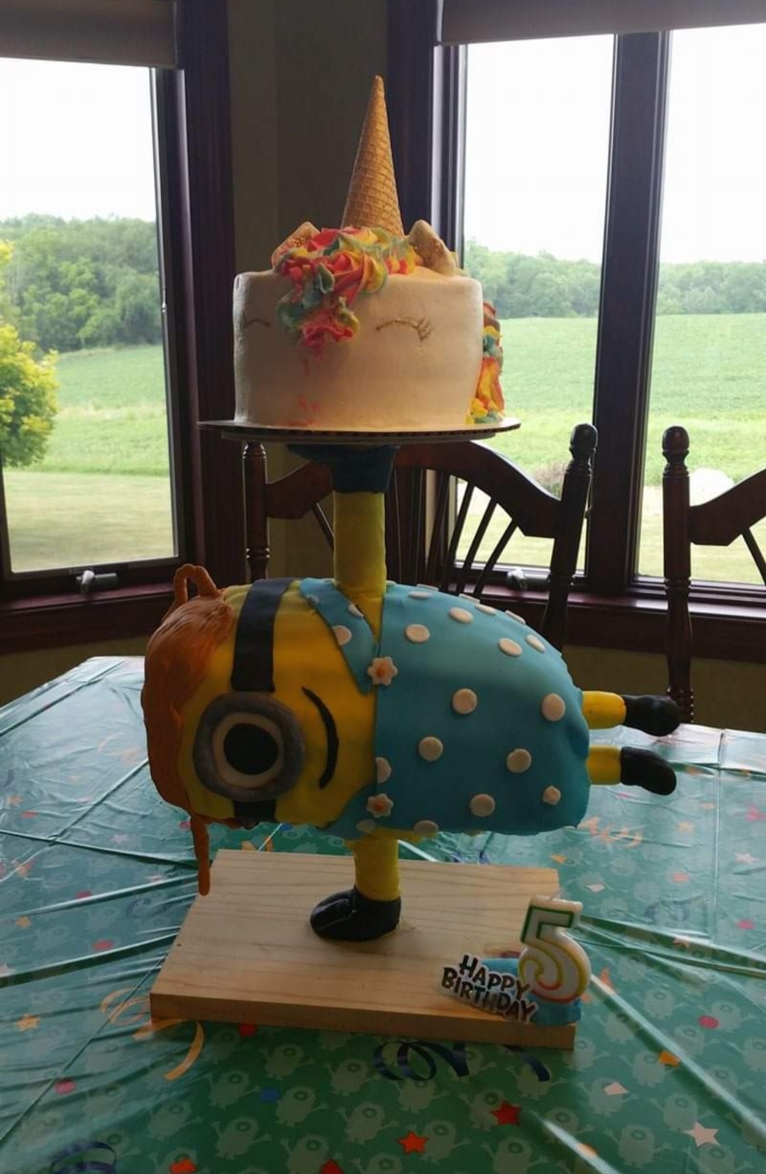 Tiered Minion and unicorn cake