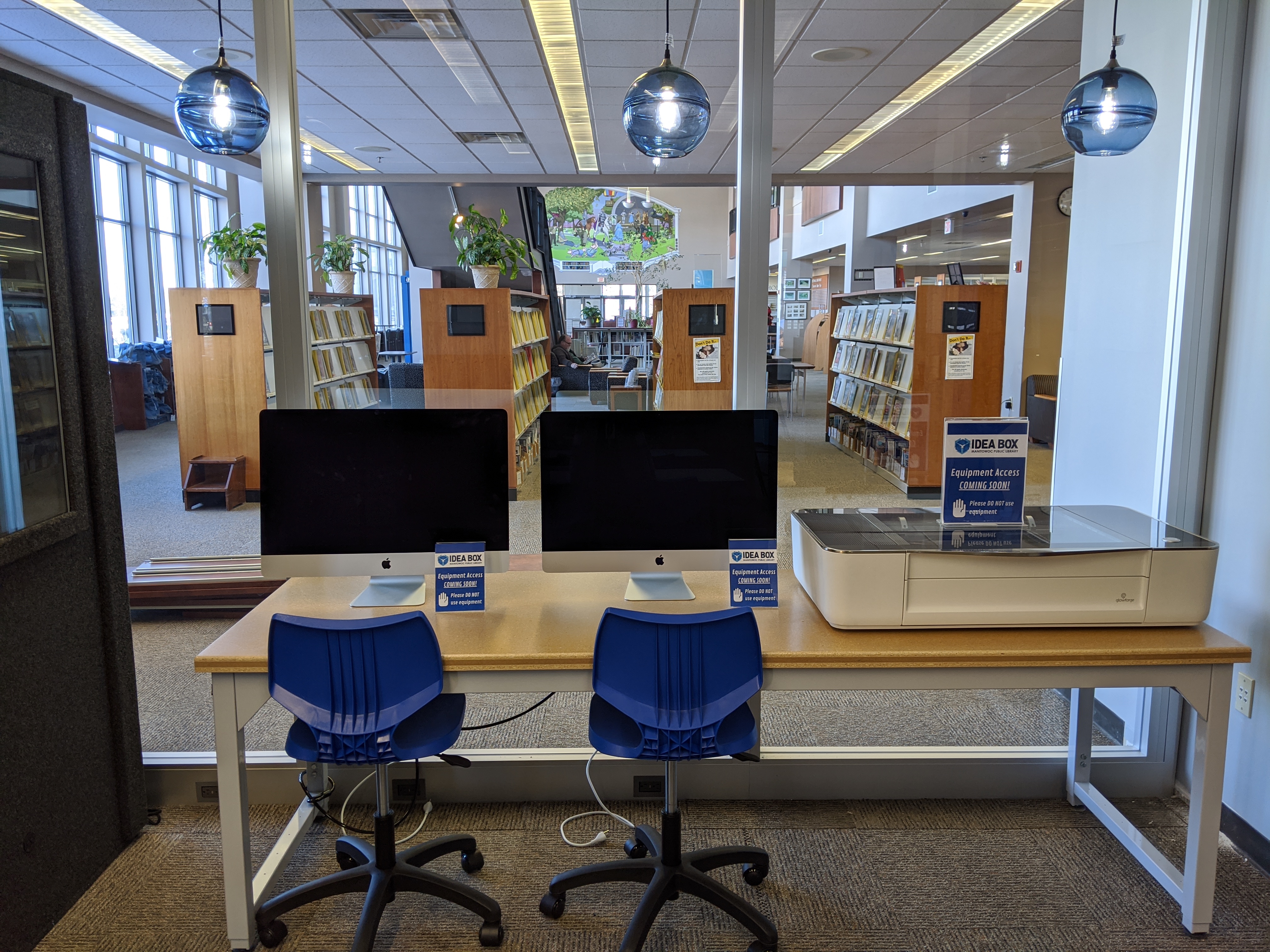 iMacs and Glowforge stations in Idea Box