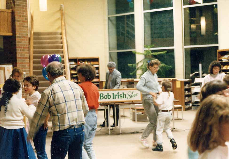 Patrons dance at library sock hop