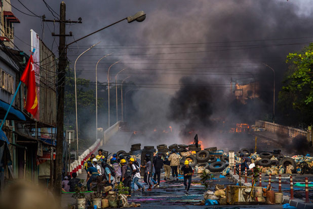 Crowds flee smoke in Myanmar