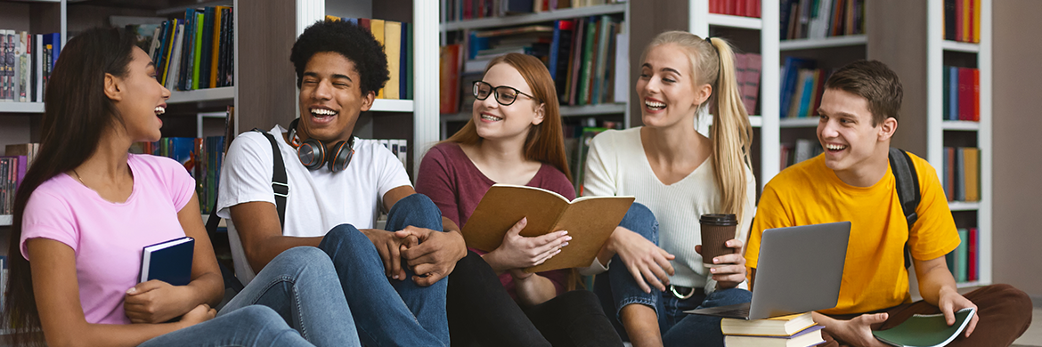 Teen page header showing a group of five teens talking in a library setting