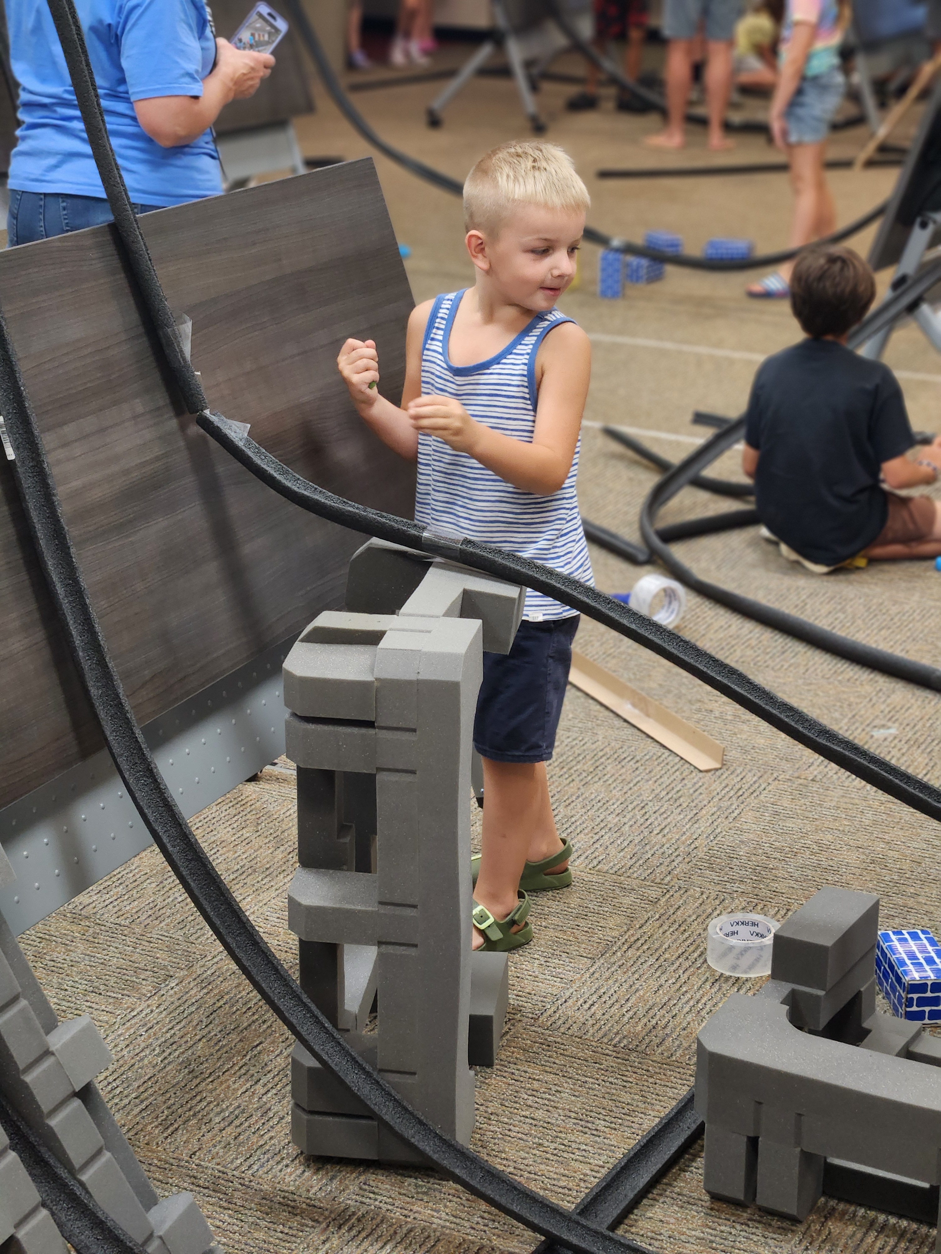 Young boy attending the Marble Run Mania event