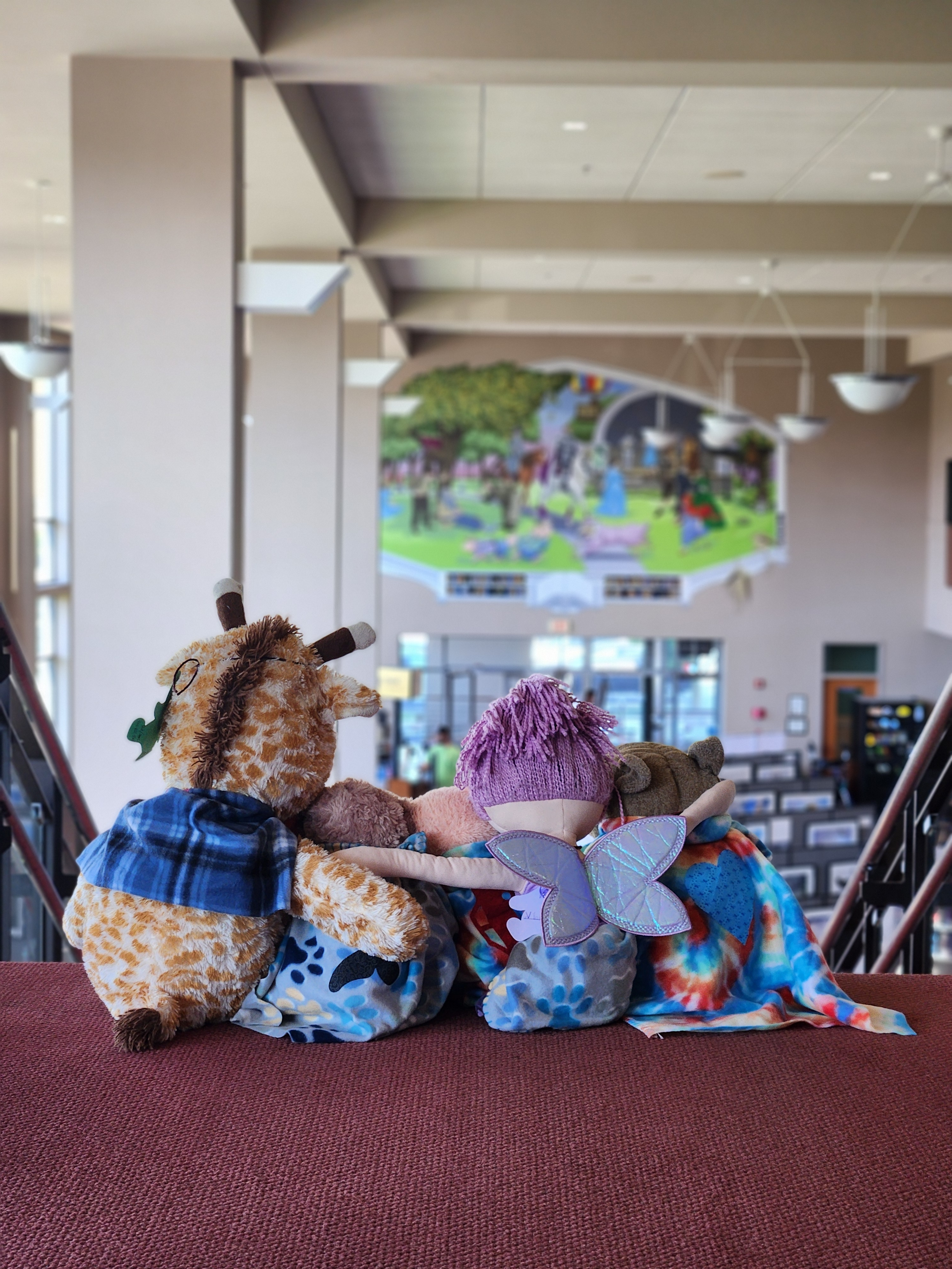 Photo of the backs of stuffed animals in the library